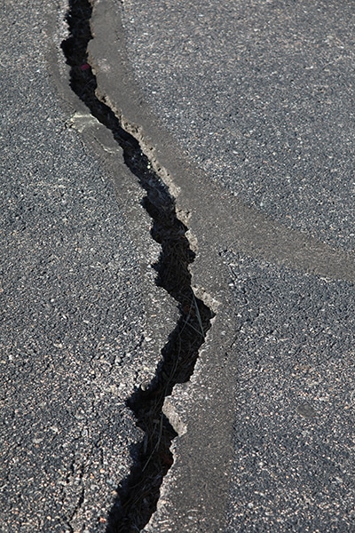 crack-filling-before Before Dutchman Asphalt
