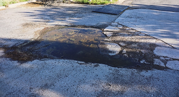 pothole-before Before Dutchman Asphalt